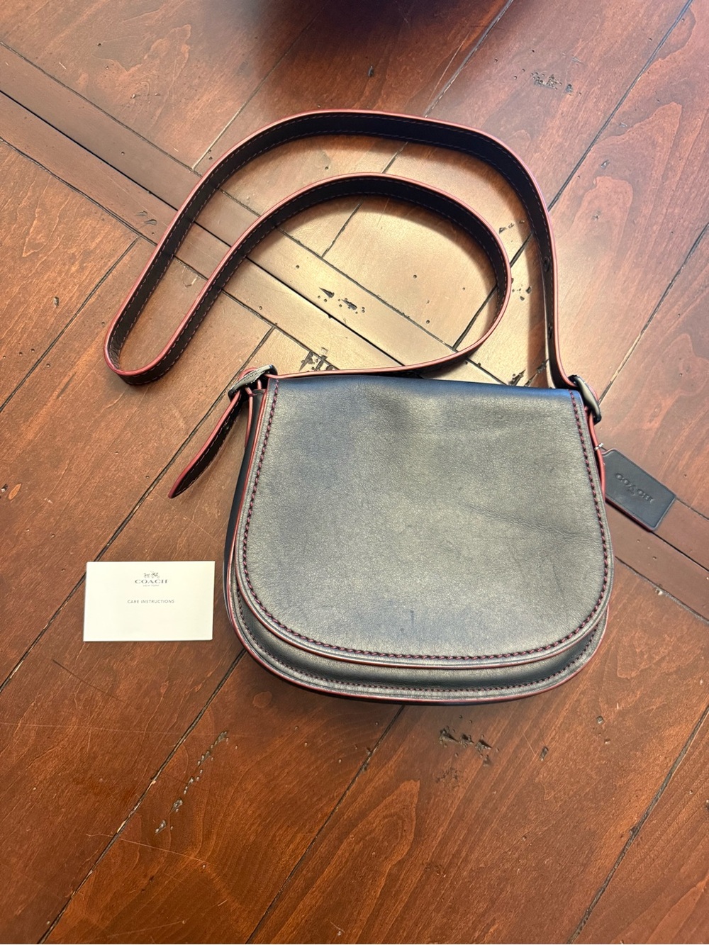 Coach 1941 Glove Tanned Leather Saddle Crossbody Bag in Black with Red Trim USED